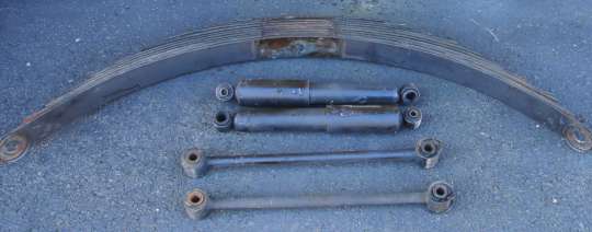 Old spring, shocks and struts removed from the rear suspension