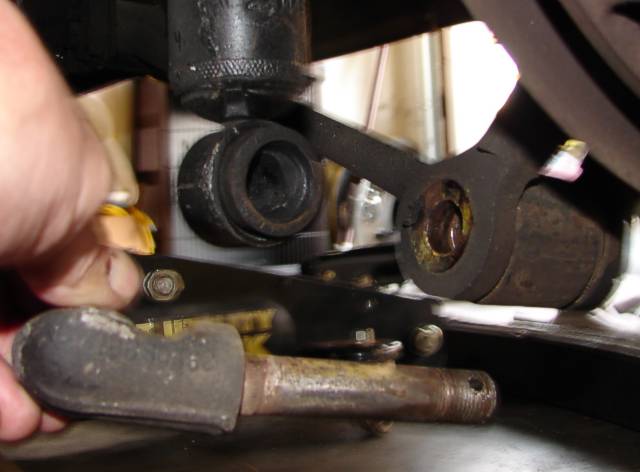 Top shock bolt removed from the rear suspension