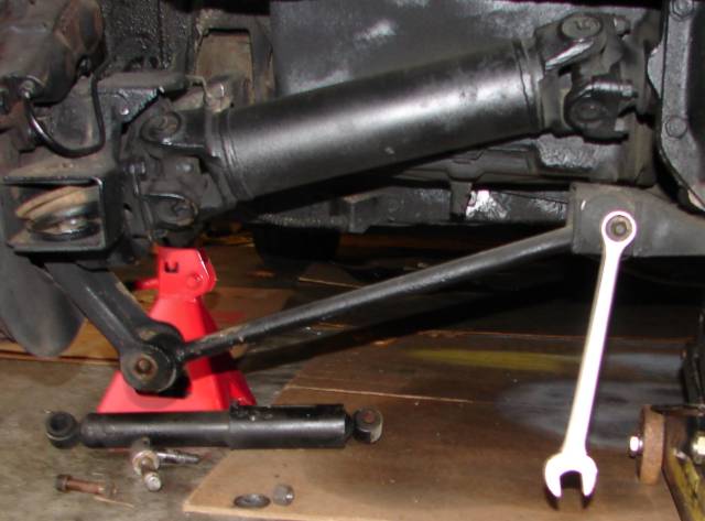 Removing the bolt that holds the strut to the strut bracket